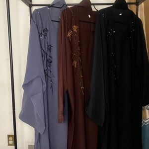 Elegant Embroidered Abayas in Black, Brown, and Lavender